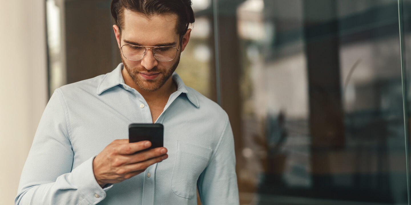 young man using mobile phone