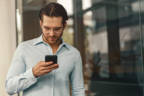 young man using mobile phone