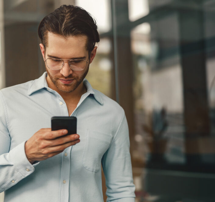 young man using mobile phone